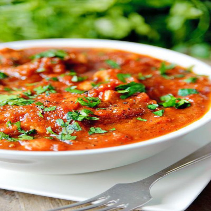 kippenlapjes in tomaten saus